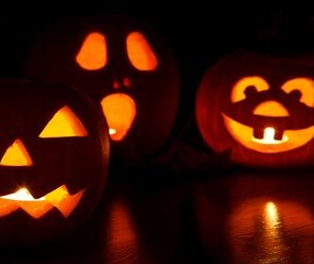 Photo of Halloween pumpkins at night
