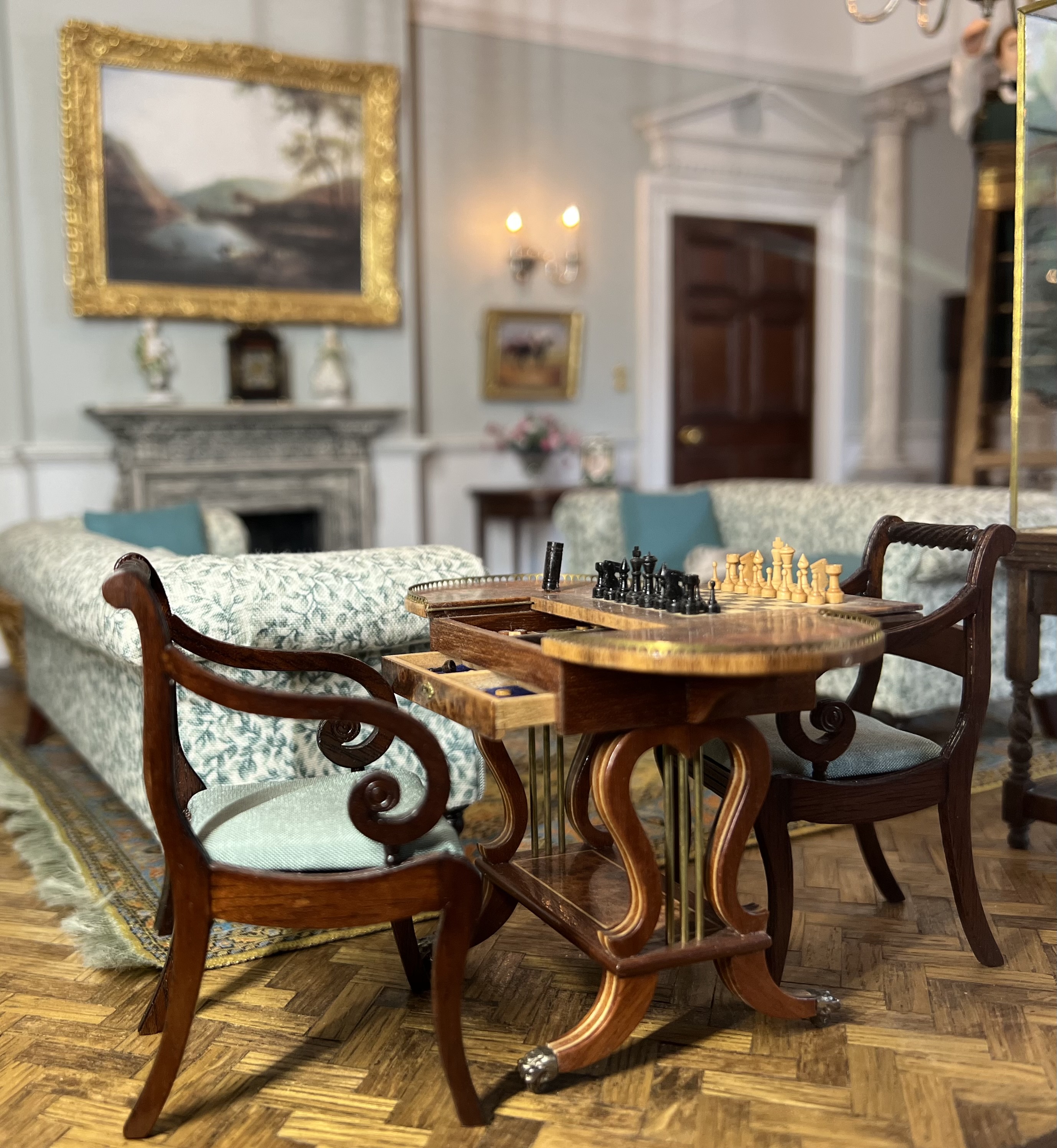 Doll's house furniture with tiny chess set