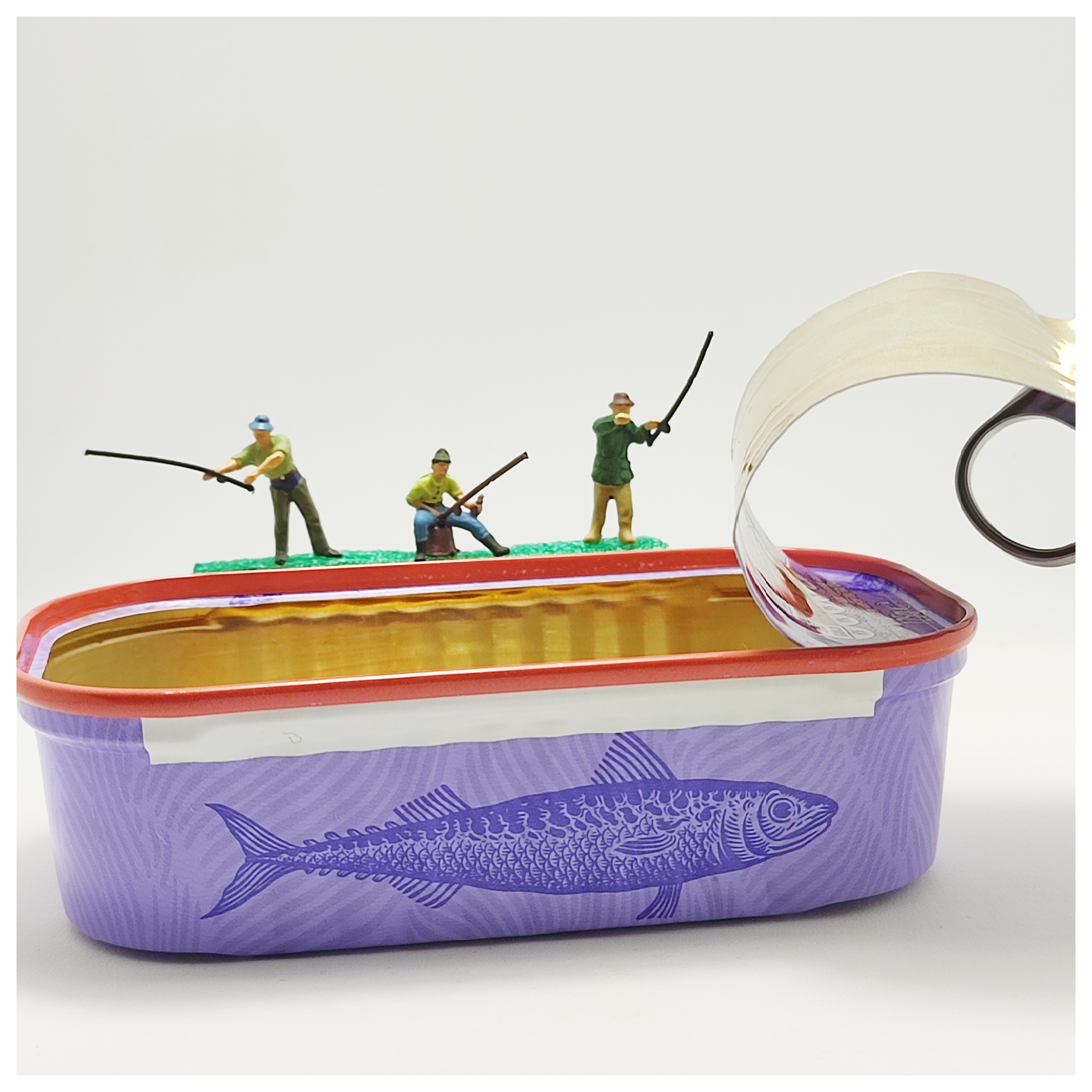 Photo of toy fishermen fishing from an open fish can